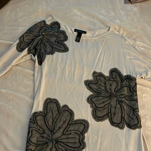 Tan tunic top off the shoulder. Size M